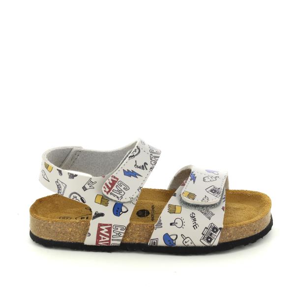 Introducing Plakton's 125459 Rock Kids Sandal – a fusion of style and comfort. Expertly crafted in Spain, these vegan and cork sandals are adorned with a white/multicolour leather print featuring rock and roll motifs. They feature a practical and adjustable design with velcro-fastening double straps ensures a secure and customised fit.