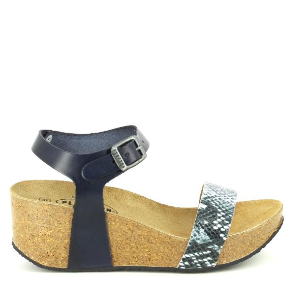 In this captivating photo, Plakton's 273023 Navy Snake Women's Wedge Sandals are showcased, exuding sophistication and style. The navy snake pattern adds a touch of elegance to the sleek thong design. With an adjustable ankle strap and cork sole, these sandals offer both comfort and fashion-forward flair. Crafted with meticulous attention to detail and made in Spain, they are the perfect choice for any smart-casual ensemble.