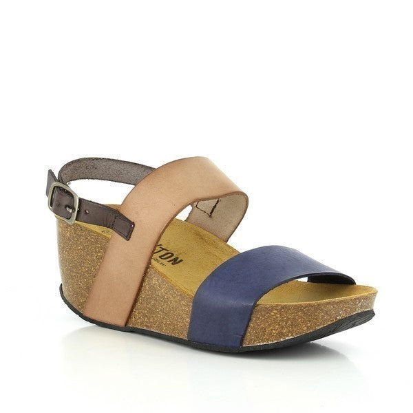 A captivating image showcasing Plakton's Blue and Tan Women's Wedge Sandals. The sleek design and adjustable straps exude sophistication, while the contrasting blue and tan colors add a pop of vibrancy. Crafted with premium vegan leather and a contoured cork footbed, these sandals offer both style and comfort for any occasion.
