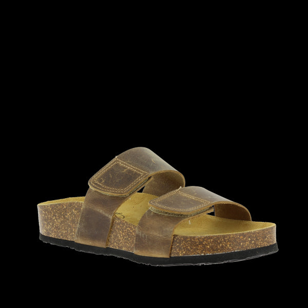 In this striking photo, Plakton's 343001 Brown Women's Sandals take center stage. The rich brown color and sleek thong design exude timeless elegance. Adjustable buckle straps offer a personalized fit, while the contoured cork sole ensures comfort with every step. Crafted with premium vegan leather, these sandals are a stylish and sustainable choice for any occasion.