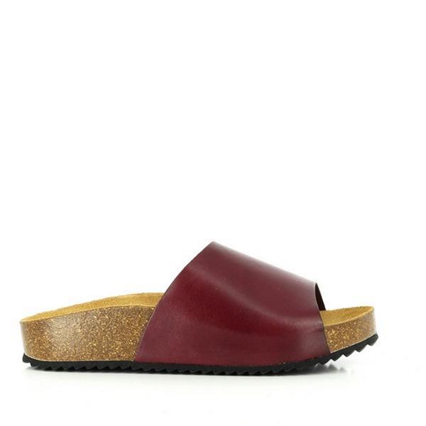 A captivating image showcasing Plakton's Plum Women's Slide. The soft upper and contrasting strap add a touch of elegance, while the contoured cork footbed promises unmatched comfort. Perfect for slipping on and going about your day with ease, these slides are a must-have addition to any wardrobe.