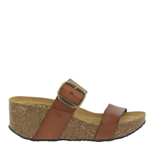 Behold the elegance of Plakton's 873004 Oak Women's Wedge Sandals from the external side. Crafted with precision, these vegan leather sandals feature adjustable straps and a 6.5cm cork wedge heel, ideal for elevating any outfit. The warm oak color adds a touch of sophistication to your look, while the memory cushion technology ensures all-day comfort. Made in Spain with premium materials, these sandals are a versatile addition to your wardrobe.